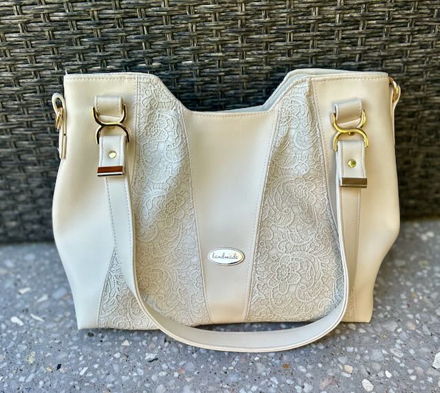 Alaula bag in creamy lacy and soft faux leather