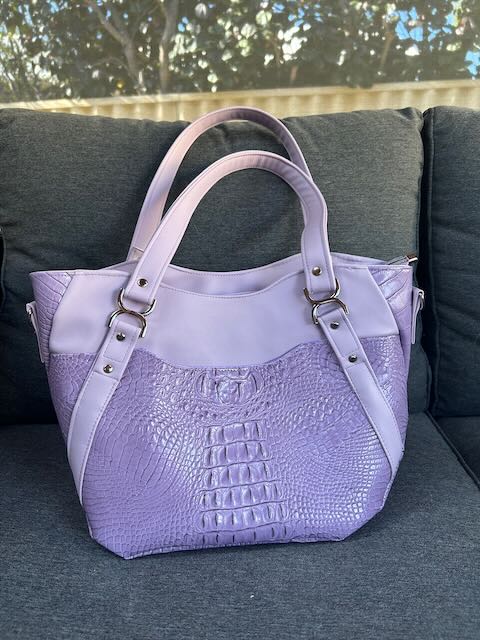 lavender faux crocodile handbag with feature straps